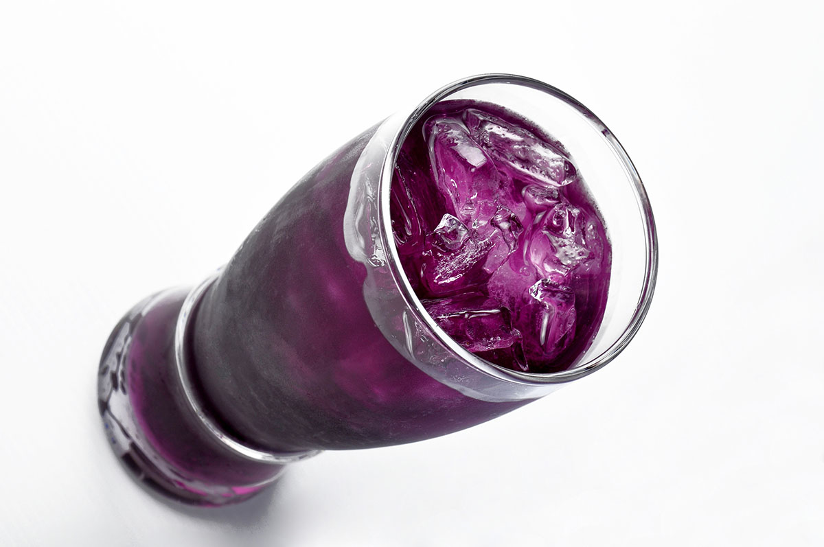 tall glass of purple Lean Drink posing the question what is lean drink