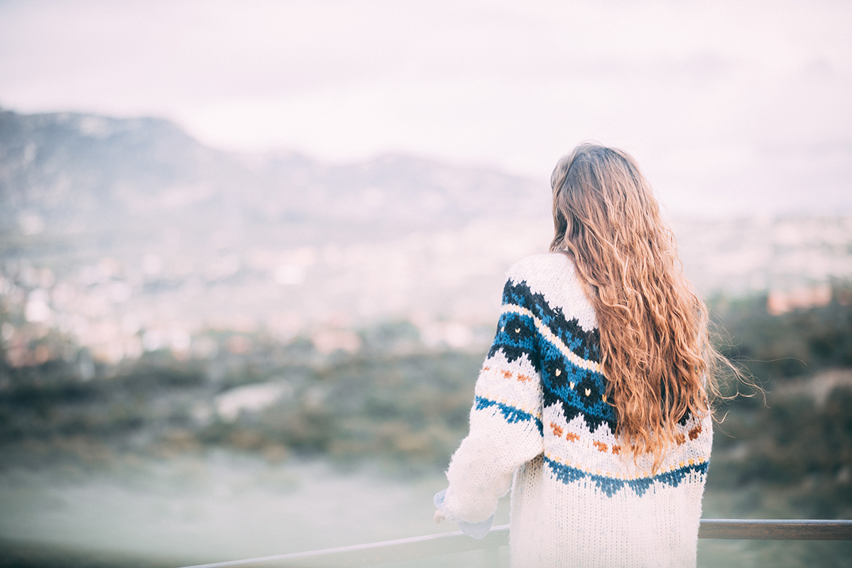 woman overlooking mountains wondering Why is Rehab Important