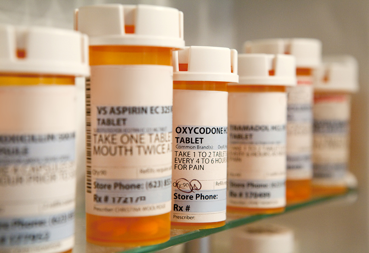 oxycodone prescription bottle and other Drugs that Require Detox in medicine cabinet