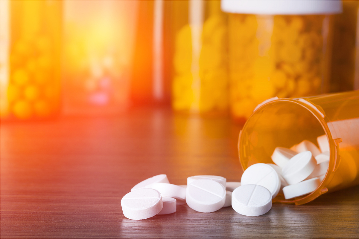 opiate vs opioid prescription bottles and pills