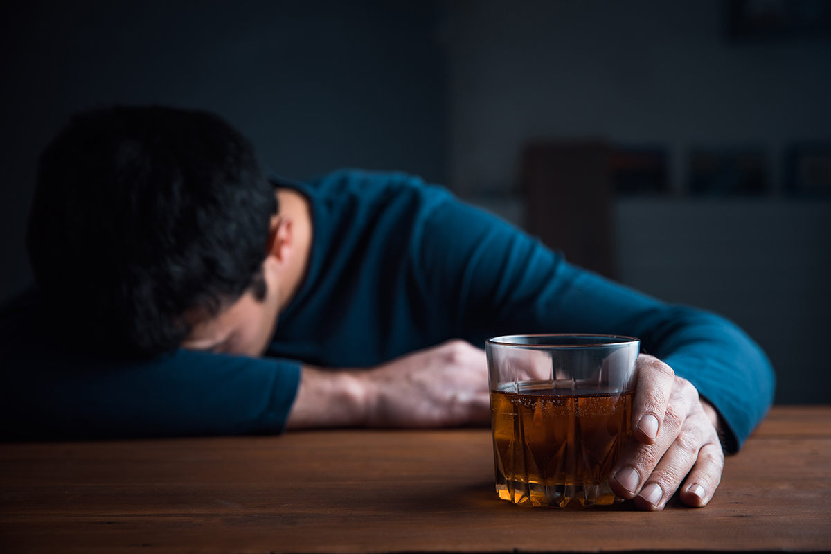 man passed out on table with alcohol learning what is relapse